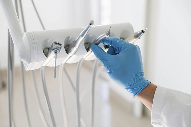 Professional Tooth Extraction technician working in Wheeling, IL